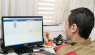 חייל מול מחשב בפייסבוק (צילום: עודד קרני ,פז"ם)