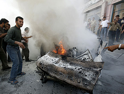 רכב פלסטיני שנפגע על ידי כלי טיס של חה