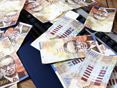 שטרות כסף (צילום: עודד קרני)