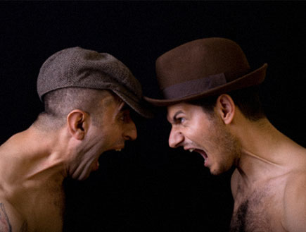 שני גברים בכובעים,ראש בראש,צועקים אחד על השני (צילום: אור גץ)