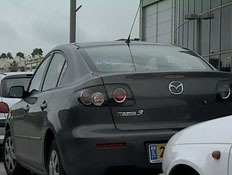 מכונית מאזדה 3 שחורה (תמונת AVI: חדשות1 ערוץ 2)
