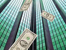 דולרים נופלים מבניין (צילום: John Foxx, GettyImages IL)