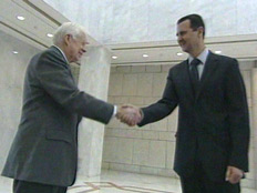קרטר ואסד בפגישה בדמשק (צילום: חדשות2)