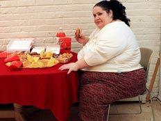 חצי מתושבי העיר סובלים מהשמנה. אילוסטרצי (צילום: דיילי מייל)