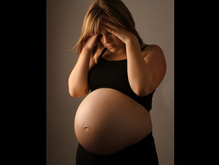 אישה בהריון עצובה (צילום: Jess Wiberg, Istock)