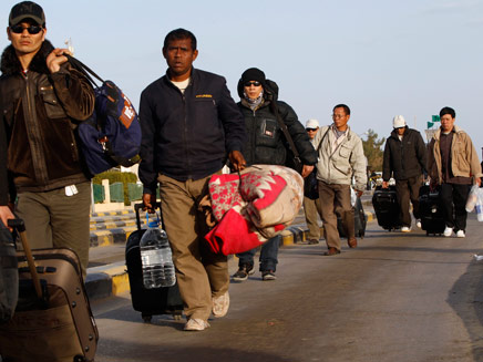 הפליטים ממשיכים לעזוב את לוב (צילום: רויטרס)