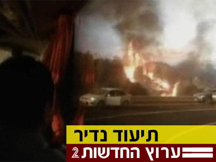 השריפה בכרמל כפי שצולמה מתוך אוטובוס הצוערים (צילום: ערוץ הכנסת)