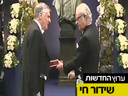 דן שכטמן מקבל פרס נובל (צילום: חדשות 2)