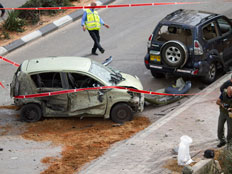 רכב שנפגע מגראד באשדוד (צילום: חדשות 2)