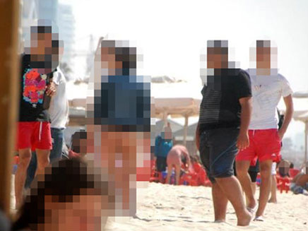 הייתם עוזרים לאדם במצוקה? תיעוד המין בחוף בוגרשוב (צילום: חדשות 2)