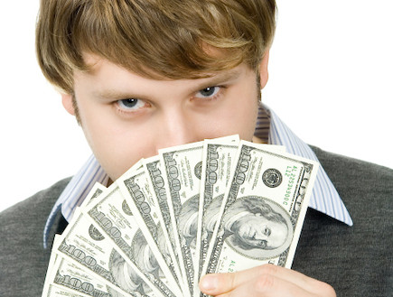 גבר עם כסף (צילום: אימג'בנק / Thinkstock)