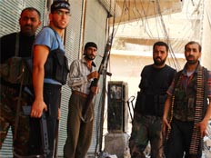 ממשיכים בלחימה. המורדים בסוריה (צילום: רויטרס)