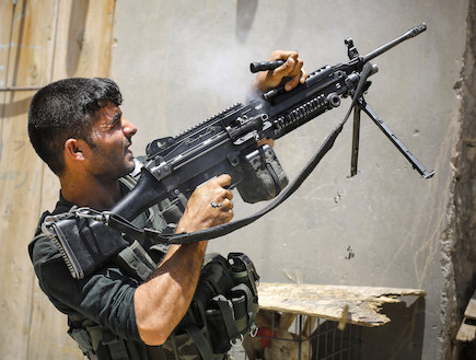 לוחם נגד הטליבן (צילום: John Cantlie, GettyImages IL)