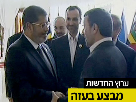 מורסי ואחמדינג'אד בפגישתם האחרונה (צילום: חדשות 2)