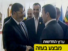 מורסי ואחמדינג'אד בפגישתם האחרונה (צילום: חדשות 2)