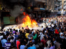 מחאה בוערת במצרים נגד הנשיא (צילום: רויטרס)