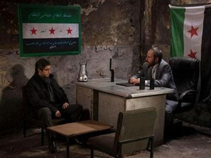 מתוך הפגישה עם מפקד המורדים (צילום: http://alkhabarpress.com)