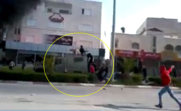 צפו: הסתערות על רכב צבא בג'נין (צילום: חדשות 2)