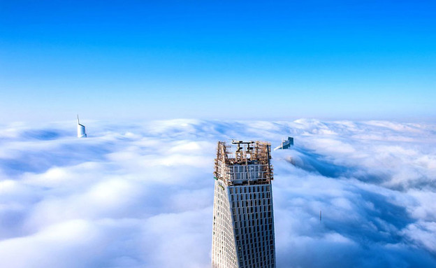 דובאי - העיר בעננים (צילום: boredpanda.com)