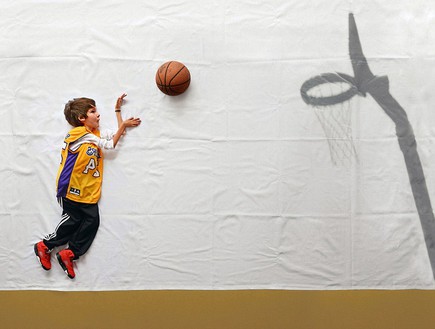 לוקה משחק כדורסל (צילום: מאטג' פליג'האן מתוך האתר mate.1x.com)