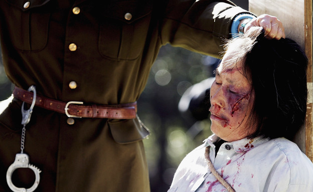 פאלון גונג - הפגנה והדגמה של עינויים (צילום: Ian Waldie, GettyImages IL)