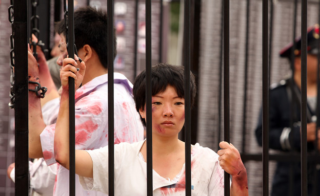 פאלון גונג - הפגנה (צילום: אימג'בנק/GettyImages)