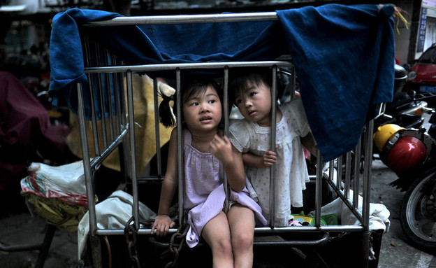 ליואויואו לין בת הארבע וטיאנטיאן בת השנתיים (צילום: chinadaily.com)