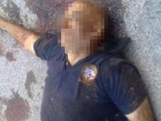 גופתו של מוחמד אסלאן כפי שפורסמה על ידי המורדים (צילום: akhbarak.net)
