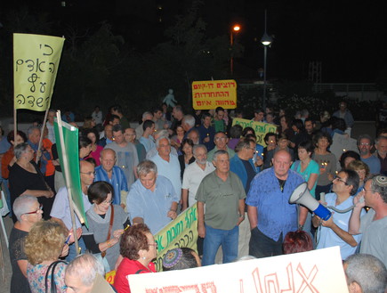 הפגנה ברחובות (צילום: אורי בן צבי)