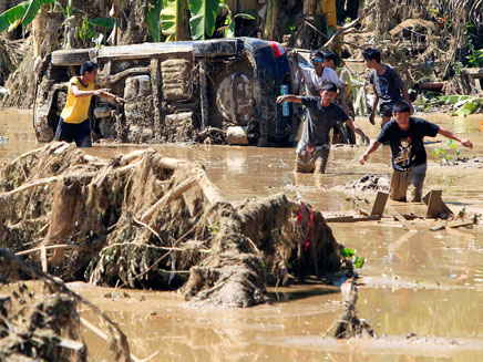 שטפונות בפיליפינים, 2012 (צילום: רויטרס)