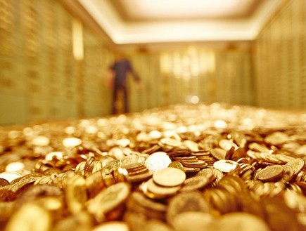 כספת מלאה במטבעות (צילום: dailymail.co.uk)