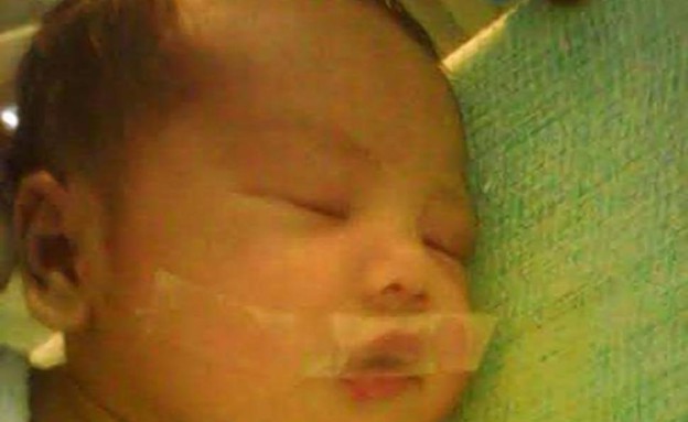 התינוק הפיליפיני (צילום:  Photo by Flash90, פייסבוק. צילום: שימוש לפי סעיף 27א' לחוק זכויות יוצרים)