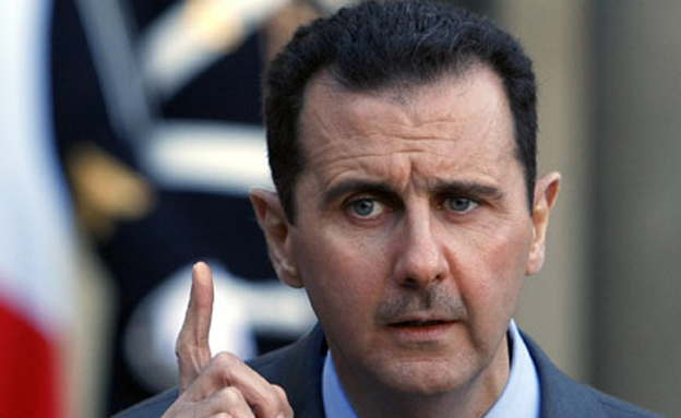 סוריה - יומן מלחמה: בוחרים נשיא בצל ההפצצות (צילום: AP)