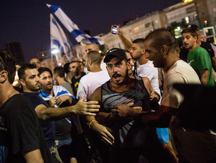 הפגנה בתל אביב 12.7 (צילום: Andrew Burton, GettyImages IL)