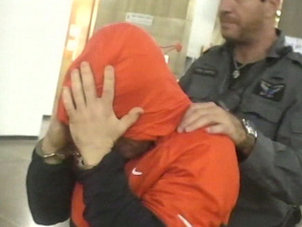 טויל בעת מעצרו (צילום: חדשות 2)