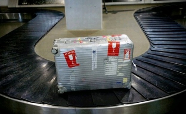 טיפים חכמים לבית - מדבקת שביר למזוודה (צילום: www.baba-mail.co.il)
