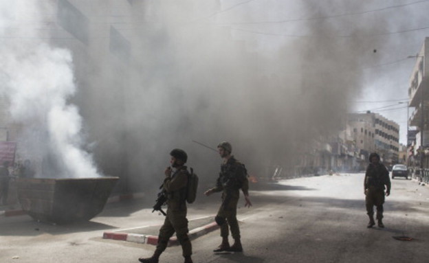 מהומות בחברון (צילום: Ilia Yefimovich, GettyImages IL)