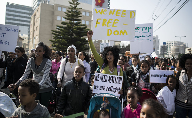 פליטות מאפריקה מפגינות בתל אביב, ינואר 2014 (צילום: Ilia Yefimovich, GettyImages IL)