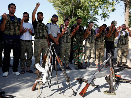 הולכים ונבלמים? כוחות המורדים בסוריה (צילום: רויטרס)