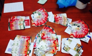 שטרות 200 מזויפים (צילום: דוברות חטיבת המשטרה)