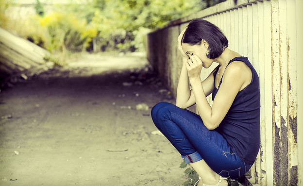 אישה עצובה (צילום: אימג'בנק / Thinkstock)