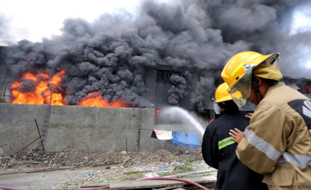 פיליפינים: עשרות נספו בשריפה (צילום: רויטרס)