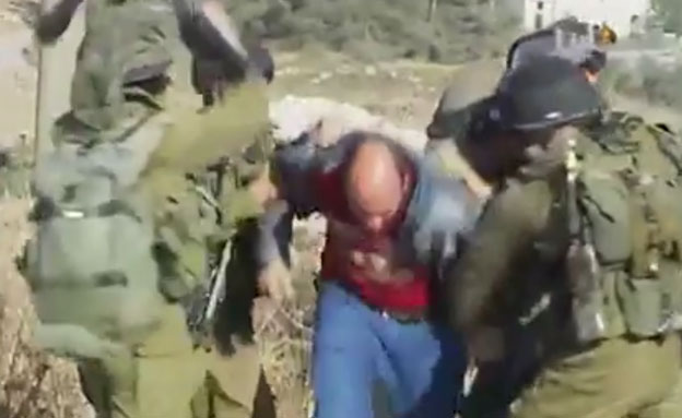 חיילי צה"ל תוקפים מכים פלסטיני ג'ילזון