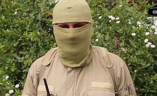 דאעש צלבו מרגל וכרתו את איבריו (צילום: מתוך סרטון הטרור)