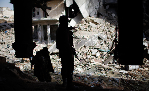 פעילי דאע"ש בסוריה, ארכיון (צילום: רויטרס)