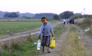 ילד פליט סורי ברוז'קה הונגריה (צילום: רויטרס)