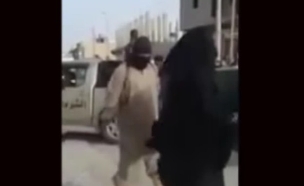 דאעש מעניש שתי נשים (צילום: מתוך סרטון של ארגון דאע"ש)