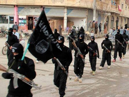 לוחמי דאעש בסוריה (צילום: Sakchai Lalit | AP)