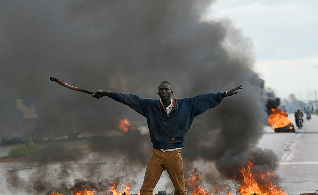 13.9 הפגנה בבורקינה (צילום: אימג'בנק/AFP)