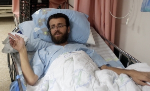 מוחמד אלקיק בבית חולים 5.2.16 (צילום: אימג'בנק/AFP)